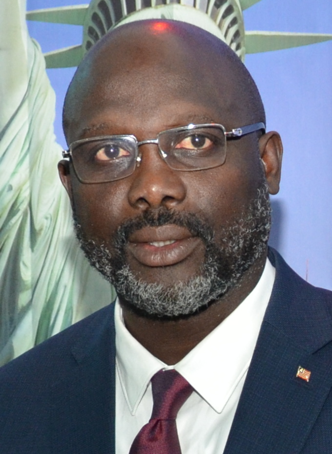 George Weah with the team, 2019